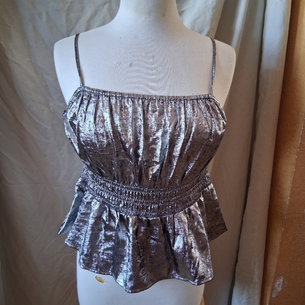 Old Navy silver metallic top with adjustable straps and ruffle hem. Size: L
